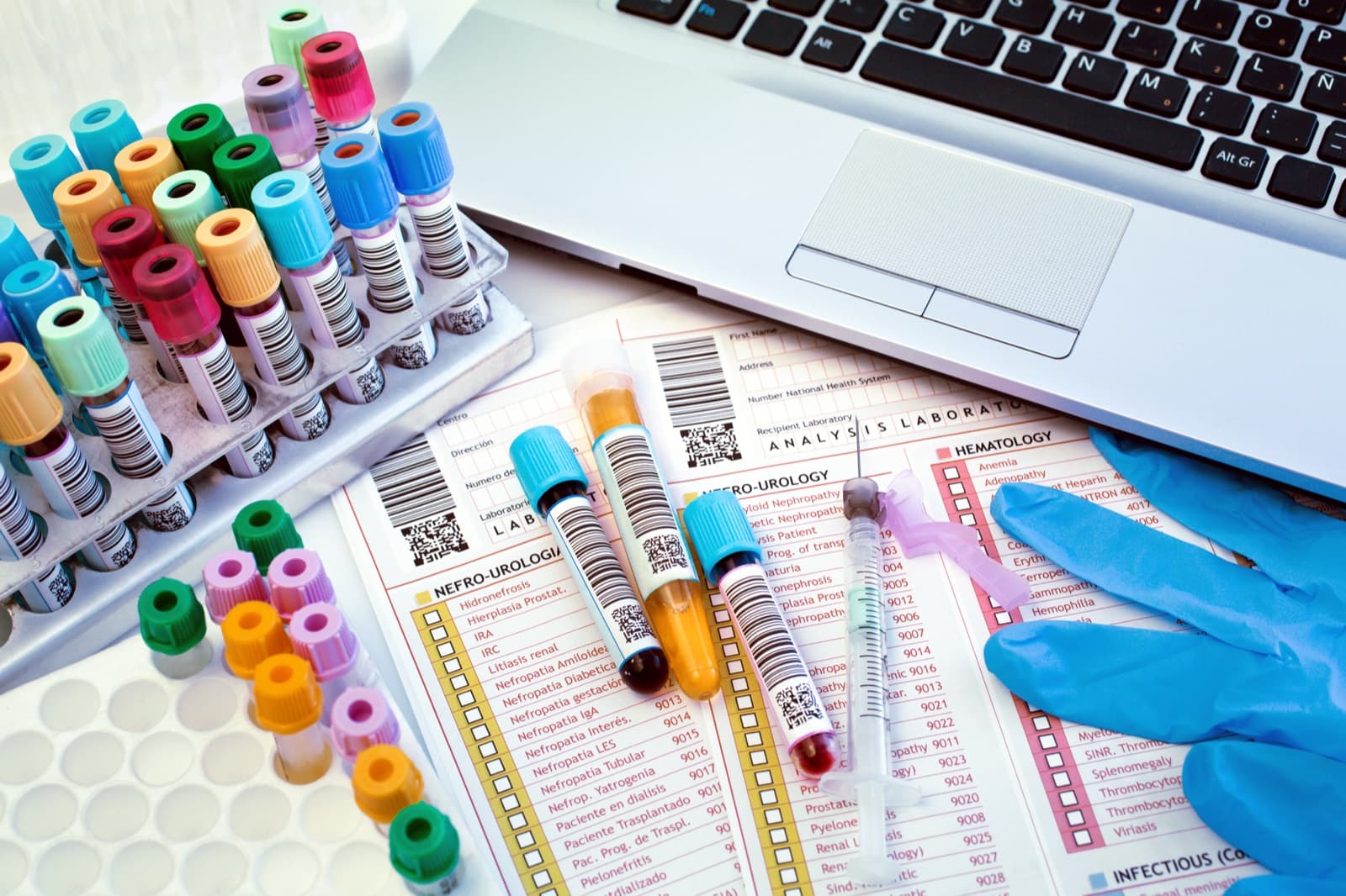 Color-capped blood tubes on laboratory requisition forms awaiting accessioning